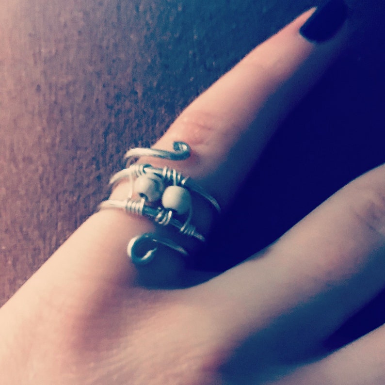 silver wire with white beads ring