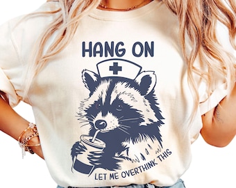 Funny Raccoon Nurse T-Shirt: Comfort Colors Overthinking Meme Tee