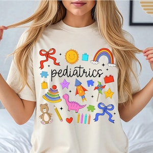 Pediatrics Shirt, PEDS Nurse Tee, Whimsical Toys T-shirt, Comfort Colors, Coquette RN, Pediatric Doctor, Doodle Art Tshirt, PICU Tee, Gift