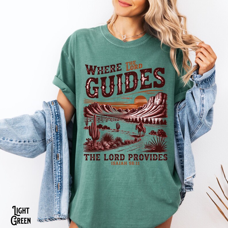 May include: A green t-shirt with a sunset scene and the text "Where the Lord Guides, The Lord Provides, Isaiah 58:11".