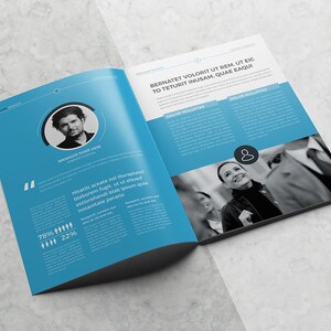 May include: A blue and white brochure with a photo of a person on the left page and a photo of a woman on the right page. The text on the left page reads "Manager Name Here" and "78% 22%". The text on the right page reads "Bernatet Volorit Ut Rem. Ut Eic To Teturit Inusam, Quae Eaqui" and "Dolor Moluptas".