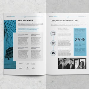 May include: A brochure template with a blue and white color scheme. The left page features a black and white photo of a glass dome ceiling. The right page features a blue and white graphic with the text "LORE, OMNIS EATUR? EM LANT." and a black and white photo of three people.