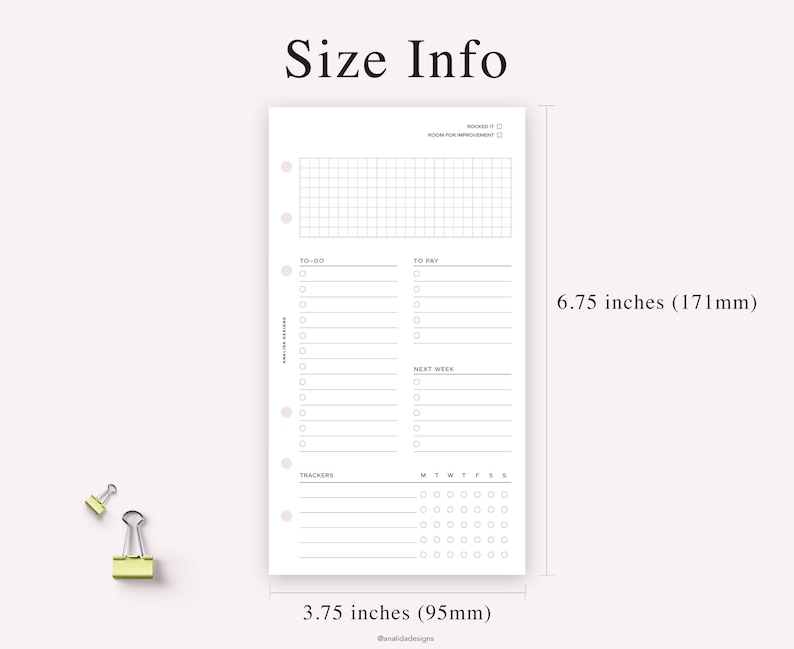 May include: A white planner insert with a grid, to-do list, and trackers. The insert is 6.75 inches (171mm) tall and 3.75 inches (95mm) wide. Two small, yellow binder clips are in the lower left corner.