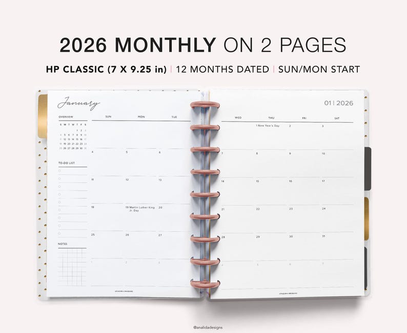 May include: Open planner with a monthly layout for 2026. The planner is labeled "2026 MONTHLY ON 2 PAGES" and "HP CLASSIC (7 X 9.25 in)". The pages are white with a calendar grid, to-do list, and notes section. The binding is rose gold.