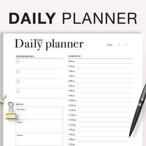 May include: A black and white daily planner with the text "Daily planner" at the top. The planner has sections for top priorities, schedule, and meals. The schedule section includes time slots from 6:00 am to 2:30 pm. The meals section includes breakfast, lunch, and dinner.