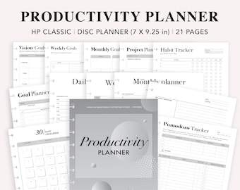 May include: A black and white productivity planner with a gray and white cover featuring the text "Productivity Planner". The planner includes pages for vision goals, weekly goals, monthly goals, project plans, habit trackers, a daily planner, a weekly planner, a monthly planner, a goal planner, a 30-day challenge, and a Pomodoro tracker.