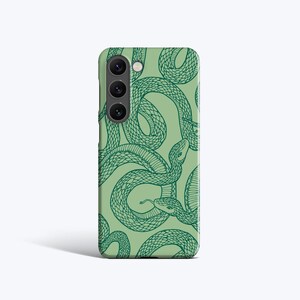 May include: A green phone case with a repeating pattern of green snakes. The snakes are detailed with scales and curved bodies. The case has a camera module with three lenses.
