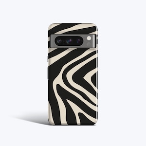 May include: Black and white zebra-print phone case with a camera lens cutout.