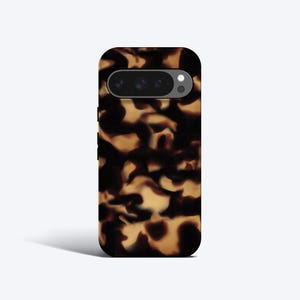 May include: A phone case with a tortoiseshell pattern in shades of brown and tan. The case has a camera cutout at the top. The case is designed to fit a smartphone.