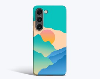 May include: A phone case featuring a mountain landscape design. The case has a teal top, a peach-colored sun, and blue mountains. The case is designed for a smartphone and has a camera cutout.