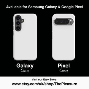two white samsung phones side by side on a black background