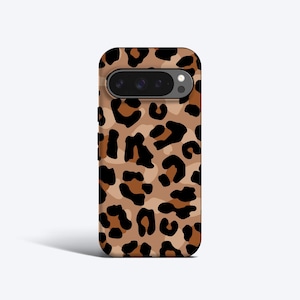 May include: A black phone case with a leopard print design. The case has a camera cutout on the back.
