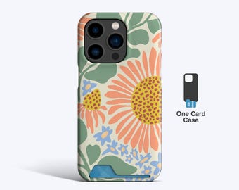 May include: A floral phone case featuring a large orange sunflower design with yellow centers, green leaves, and blue flowers. The case has a built-in card holder and the text "One Card Case".