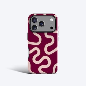 May include: A burgundy phone case featuring a repeating pattern of light pink, wavy lines. The case has a black border and a camera cutout. The phone case is designed to fit a smartphone.