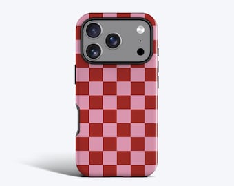 May include: A smartphone case featuring a repeating checkerboard pattern in alternating shades of dark red and light pink. The case includes a rectangular cutout at the top to accommodate a triple-lens camera system and a flash, with black trim.