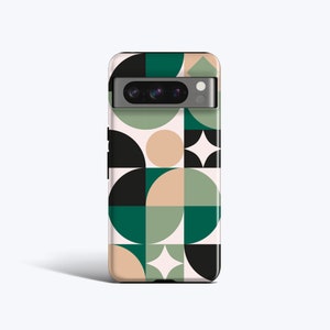 May include: A phone case with a geometric pattern of black, green, and beige circles and squares. The case has a camera cutout with three lenses.