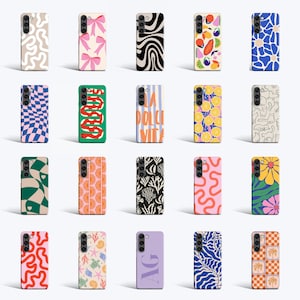 a bunch of cell phones with different designs on them