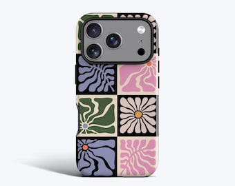 May include: A smartphone case featuring a grid pattern of six squares, each containing a distinct floral or leaf motif in shades of pink, purple, green, and black. The design includes wavy lines and petal shapes, with a cutout for the camera lens.
