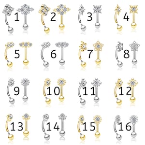 Pu&ograve; includere: Un set di 16 gioielli per il corpo, ognuno con un design diverso. I gioielli sono realizzati in metallo argentato e dorato e presentano cristalli trasparenti. I design includono fiori, stelle e altre forme geometriche. I gioielli sono disposti in quattro file di quattro pezzi ciascuna.
