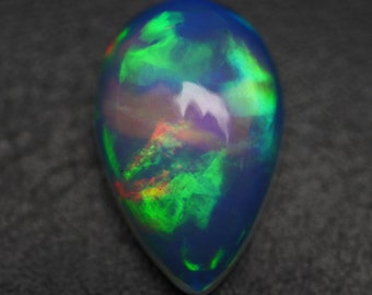0.92 Carat 9.8x6.8x3.3 MM Rare Quality Ethiopian Multi Color Opal Pear Shape Cabochon