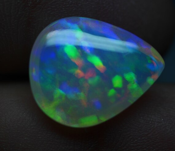 0.92 Carat 9.8x6.8x3.3 MM Rare Quality Ethiopian Multi Color Opal Pear Shape Cabochon