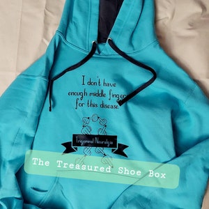 I don&#39;t have enough middle fingers for this disease. Trigeminal Neuralgia awareness turquoise hooded sweatshirt!