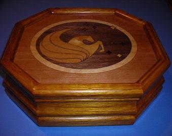 Carved music box with original designed handmade wood inlay       Artisan made in Virginia.