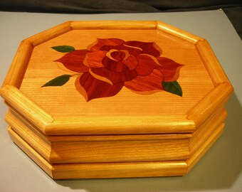 Carved music box with original designed handmade wood inlay       Artisan made in Virginia.