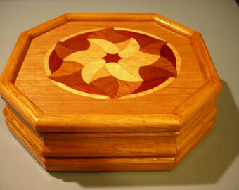 Carved music box with original designed handmade wood inlay