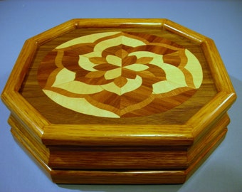 Carved music box with original designed handmade wood inlay       Artisan made in Virginia.