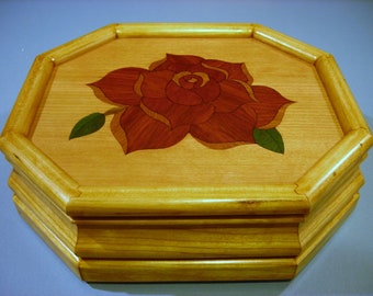 Carved music box with original designed handmade wood inlay       Artisan made in Virginia.