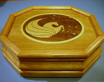 Carved music box with original designed handmade wood inlay       Artisan made in Virginia.