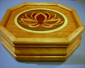 Carved music box with original designed handmade wood inlay       Artisan made in Virginia.