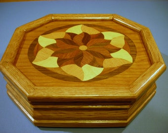 Carved music box with original designed handmade wood inlay       Artisan made in Virginia.