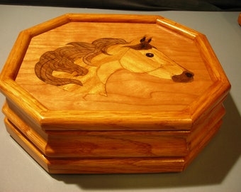 Carved music box with original designed handmade wood inlay       Artisan made in Virginia.