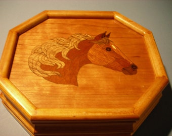 Carved music box with original designed handmade wood inlay       Artisan made in Virginia.