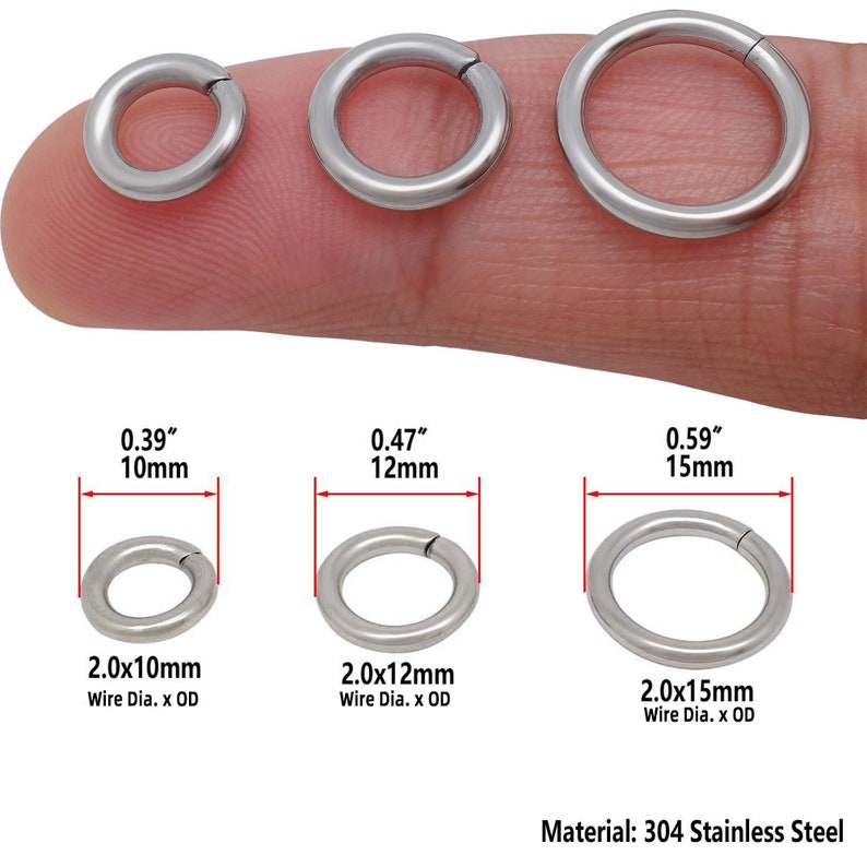 K&ouml;nnte beinhalten: Drei silberne Sprungringe in verschiedenen Gr&ouml;&szlig;en. Die Ringe haben einen Durchmesser von 0,39 Zoll (10 mm), 0,47 Zoll (12 mm) und 0,59 Zoll (15 mm). Die Ringe sind aus 304er Edelstahl.