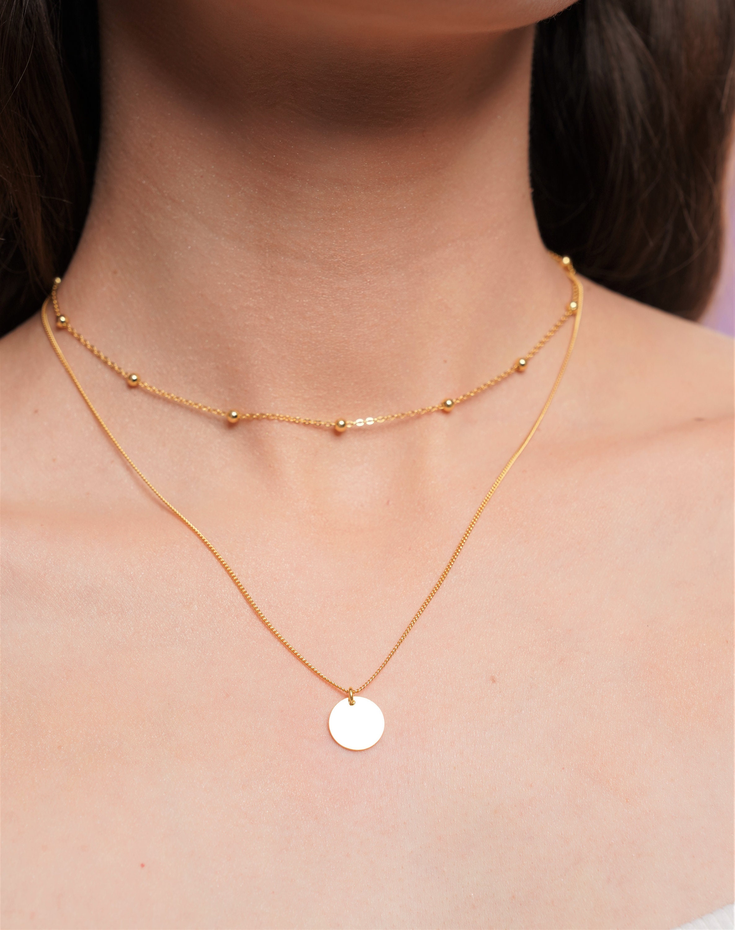 Gold disc layered best sale necklace