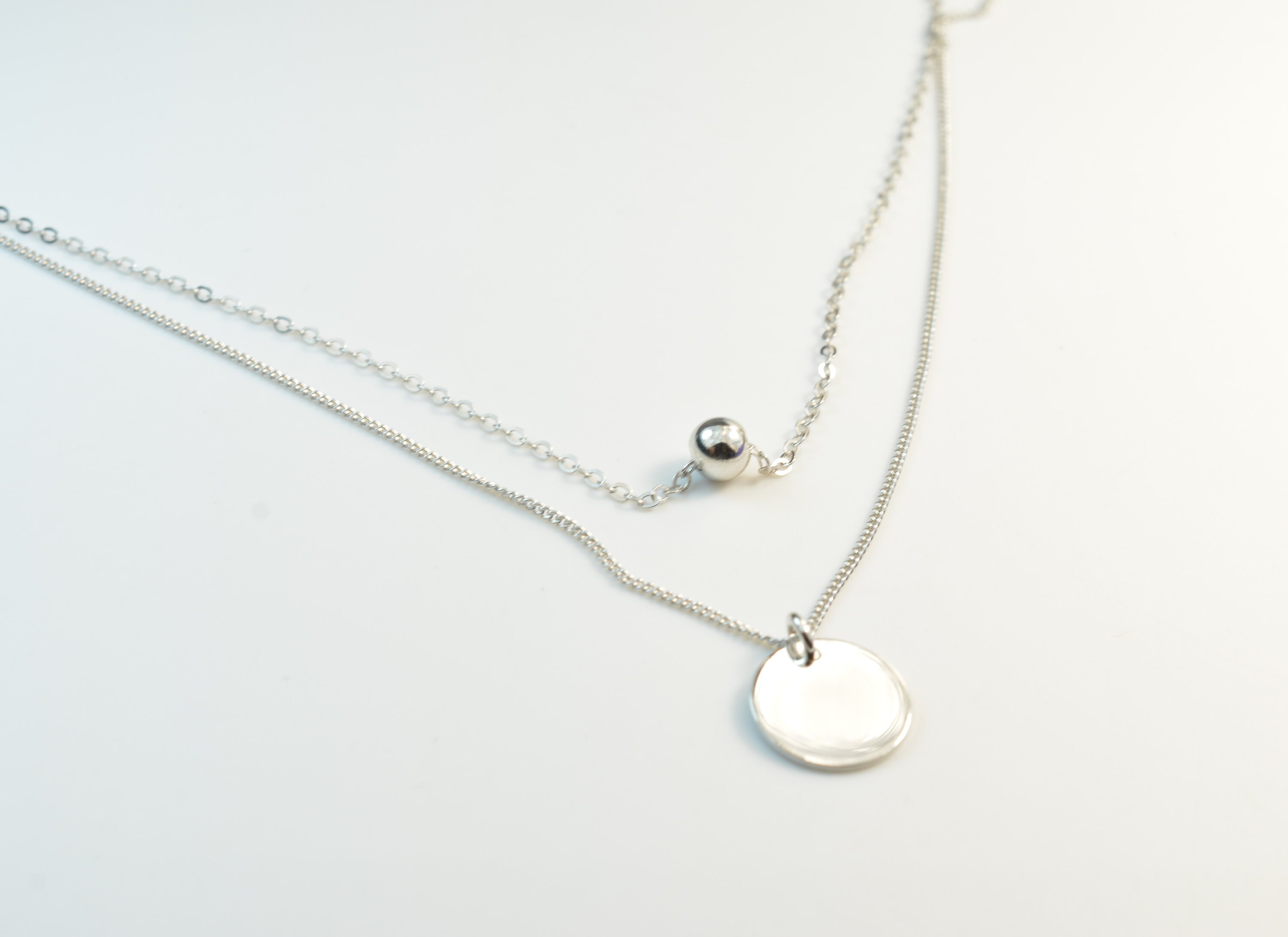 Layered gold disc best sale necklace