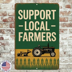 May include: A rectangular metal sign with the text "SUPPORT - LOCAL - FARMERS" in white letters on a green background. A black tractor is depicted below the text, with wheat stalks along the bottom. The sign has a distressed, vintage look.