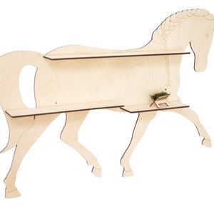 May include: A wooden horse-shaped shelf with two shelves. The horse is light brown and has a braided mane. The shelves are made of plywood and have a natural wood finish.