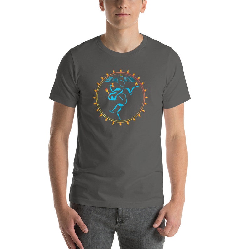 May include: A dark gray t-shirt with a blue and orange graphic of a dancing figure inside a circle of flames.