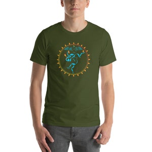 May include: A green t-shirt with a blue and yellow graphic of a dancing figure in a circle of flames.