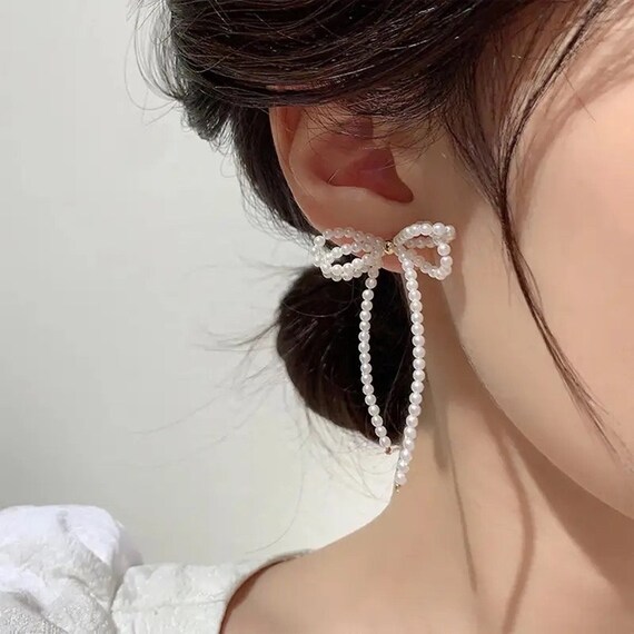 Pearl on sale bow earrings