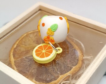 Perle dreadlocks fleurs printanières : breloque orange, fleurs pastel