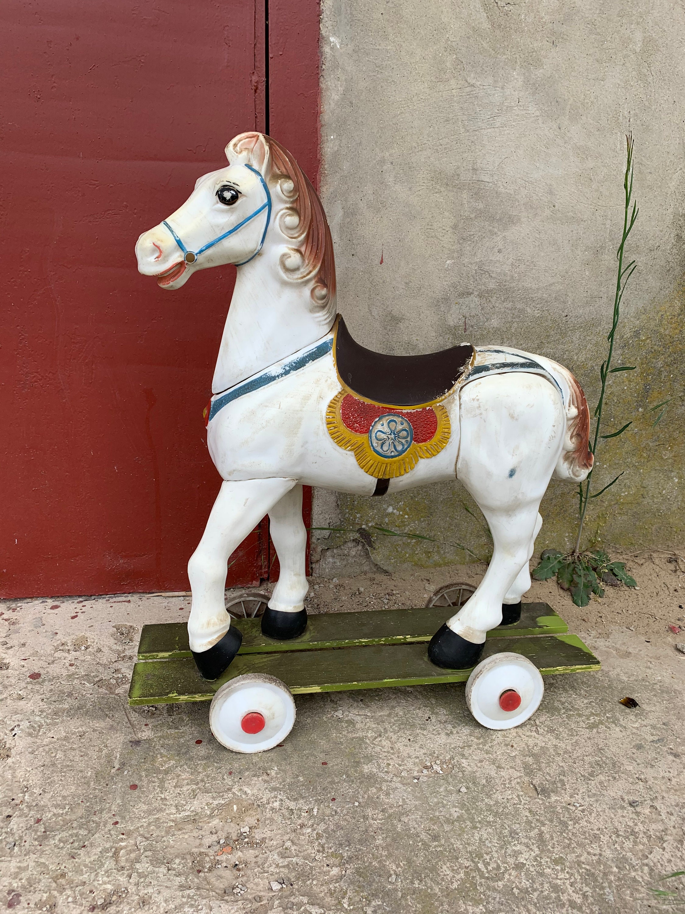 Plastic riding horse hotsell