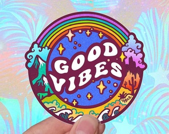 May include: A colorful sticker with a rainbow, stars, and waves. The sticker says "GOOD VIBES" in a retro font.
