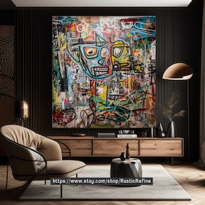 May include: A colorful abstract painting with a large, cartoon-like face in the center. The painting is done in a graffiti style with bold lines and bright colors. The background is a mix of white, black, and gray.