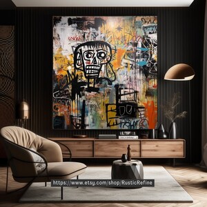 Peut inclure: Peinture abstraite avec une figure de cr&acirc;ne noir et blanc au centre. L'arri&egrave;re-plan est un m&eacute;lange color&eacute; de jaune, orange, bleu, vert et rose avec des lignes et des gribouillis noirs. La peinture est encadr&eacute;e et accroch&eacute;e &agrave; un mur noir.