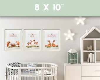 May include: Three framed prints with watercolor illustrations of animals and the words "Be Curious", "Be Wise", and "Be Creative". The prints are displayed on a white wall in a nursery setting.